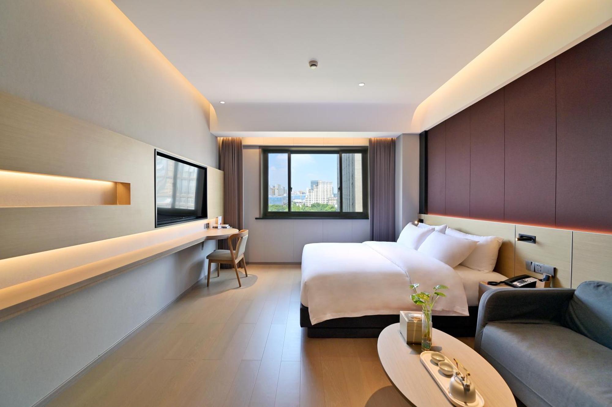 Maison New Century Tongxiang Buitenkant foto